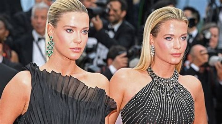 Amelia Spencer stuns in slinky bridal outfit in photos with identical twin