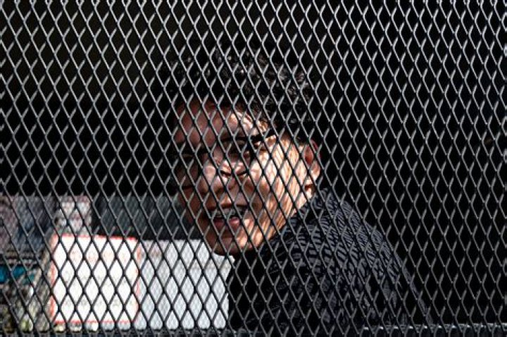 Two Thai journalists arrested for covering anti-monarchist vandalism of temple wall freed on bail